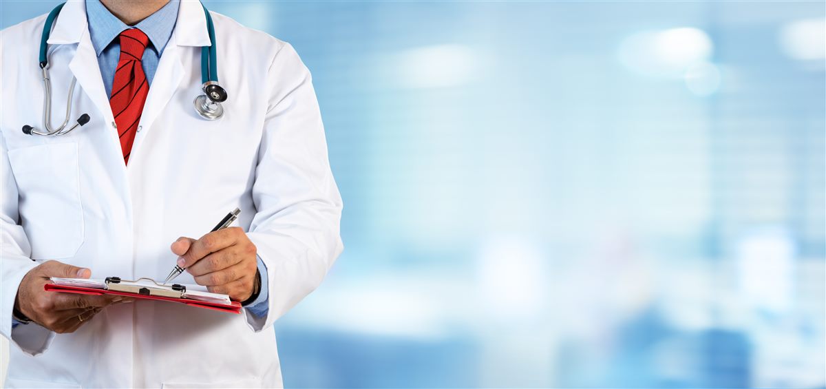 Doctor with patient records — the complete digital ecosystem for modern clinics and hospitals
